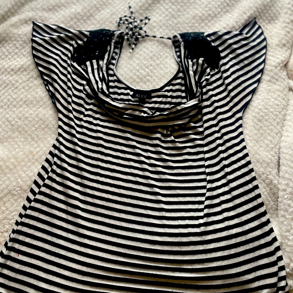 Black and white stripped short sleeve shirt with black lace on the shoulder